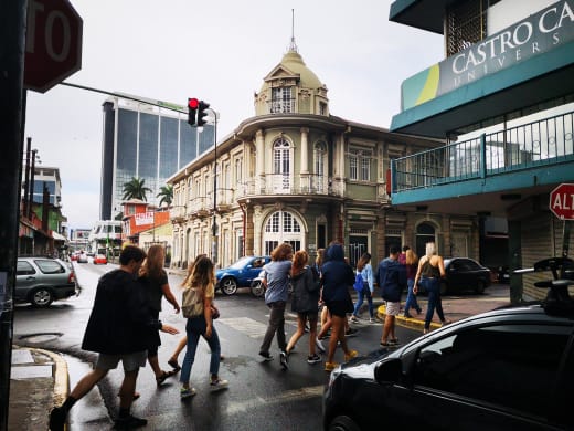 A group of students walking through a street in San Jose, Costa Rica.
